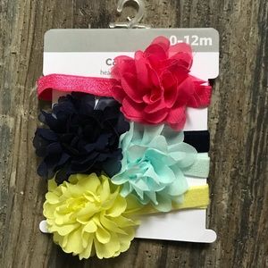 Carter’s baby girl 4-piece headband like new